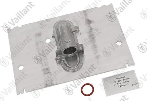 Vaillant Umstellsatz auf einer Metallplatte. Enthält ein Ventil und eine Dichtung. Beschriftung mit technischen Daten.